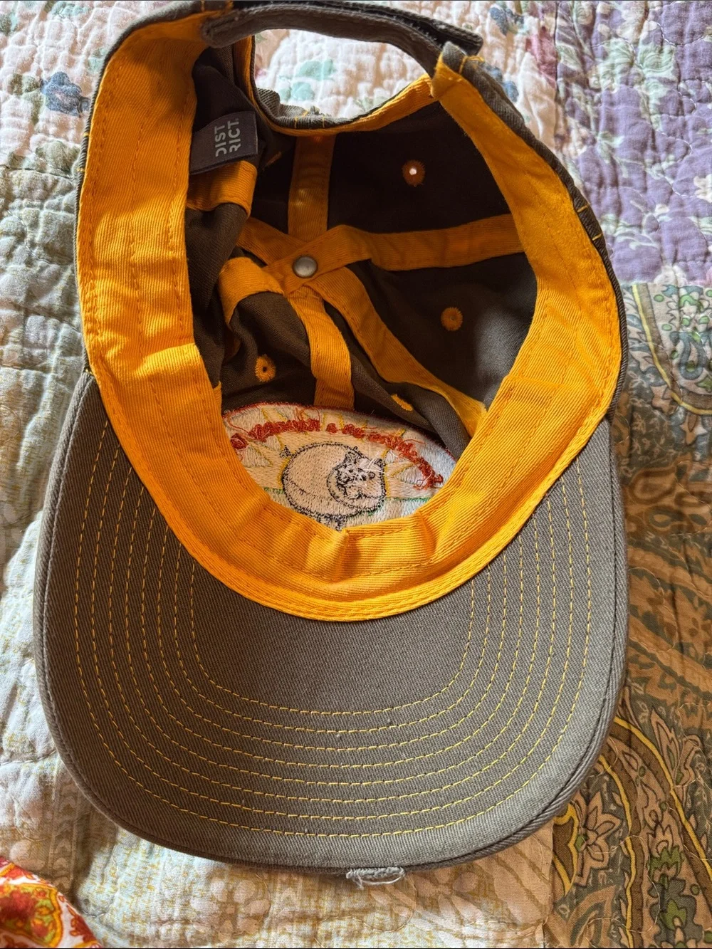 District Green Distressed Baseball Cap with Yellow Stitching and Patch